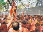 Congress candidate Ravindra Dhangekar with supporters celebrates his victory in the Kasba Peth Assembly bypoll, March 2, 2023. (PTI)
