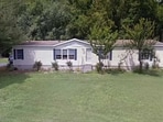 The home of Melissa Schrock, who grazed her goats on her neighbor’s land and won squatter’s rights.