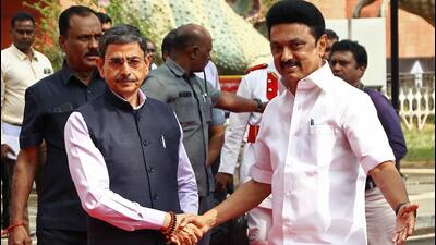 Chennai, Jan 30 (ANI): Tamil Nadu Governor RN Ravi exchanges greetings with State Chief Minister MK Stalin at the tribute-paying ceremony of Mahatma Gandhi on his death anniversary, at the Government Museum, Egmore, in Chennai on Monday. (ANI Photo) (Anathakrishnan L)