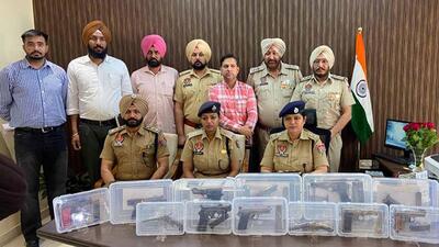 Police recovered 13 arms, including pistols, and ammunition, from the arrested accused in Ludhiana. (HT Photo)