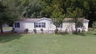 The home of Melissa Schrock, who grazed her goats on her neighbor’s land and won squatter’s rights. (New York Post) The home of Melissa Schrock, who grazed her goats on her neighbor’s land and won squatter’s rights. (New York Post)