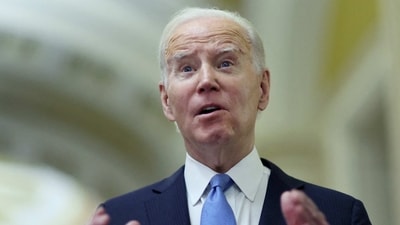 U.S. President Joe Biden speaks to the news media after attending a closed Senate Democratic Caucus lunch at the U.S. Capitol in Washington, (Reuters)
