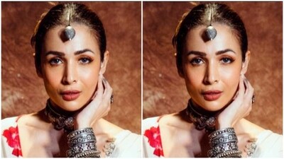 Malaika decked up in a slip blouse featuring multicoloured embellishments and embroidery work in silver threads. She further teamed it with a white satin skirt with gathered details at one side. (Instagram/@malaikaaroraofficial) Malaika decked up in a slip blouse featuring multicoloured embellishments and embroidery work in silver threads. She further teamed it with a white satin skirt with gathered details at one side. (Instagram/@malaikaaroraofficial)