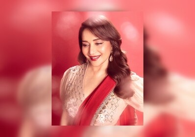 Soft retro curls are a timeless and glamorous hairstyle that can add a touch of vintage flair to your look. (Instagram/@madhuridixitnene) Soft retro curls are a timeless and glamorous hairstyle that can add a touch of vintage flair to your look. (Instagram/@madhuridixitnene)