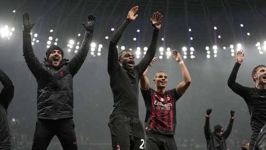 AC Milan players celebrate at the end of the Champions League round of 16 second leg soccer match between Tottenham Hotspur and AC Milan at the Tottenham Hotspur stadium in London, Wednesday, March 8, 2023. The match ended 0-0 with Milan progressing 1-0 on aggregate. (AP Photo/Alastair Grant) (AP)