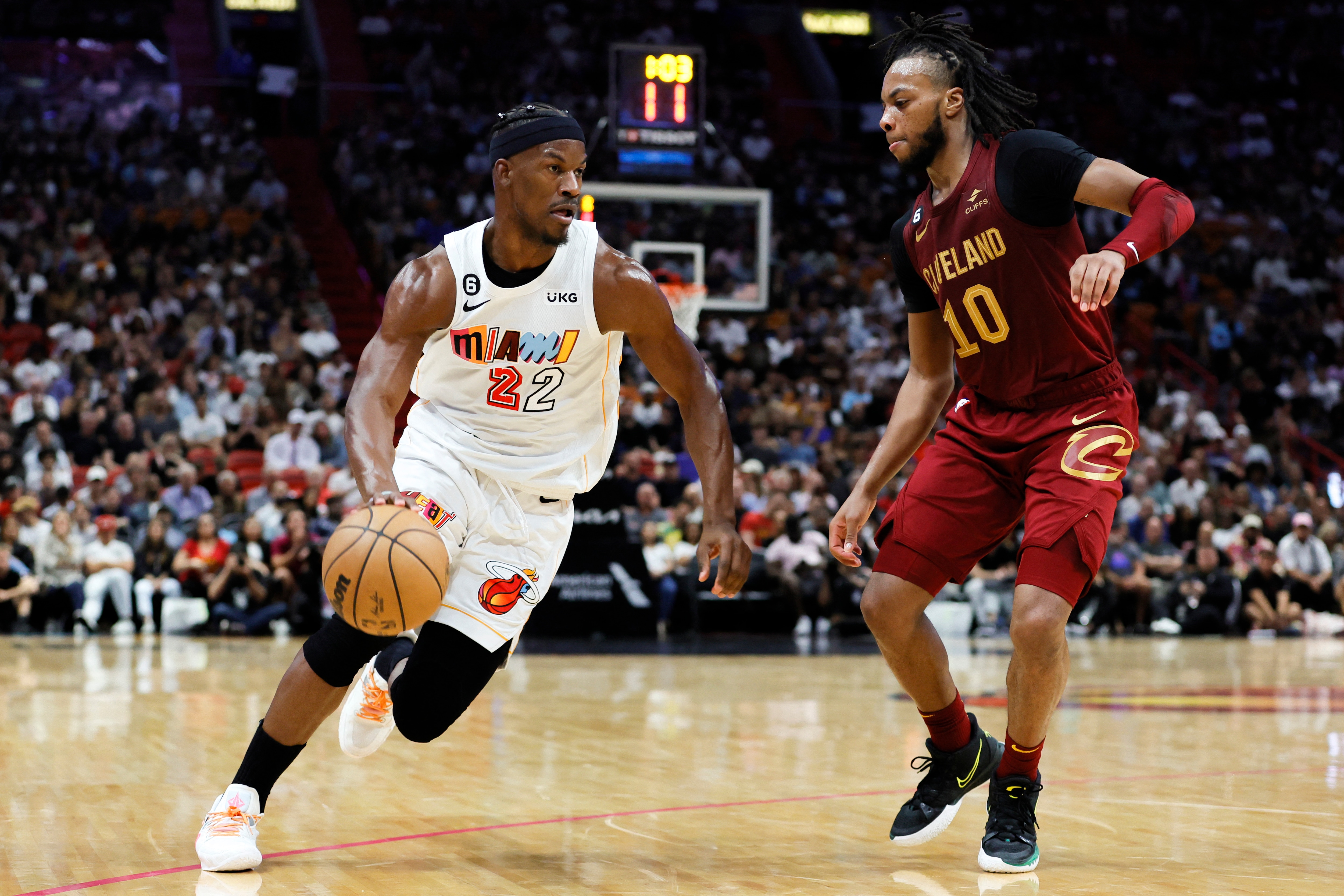 Miami Heat forward Jimmy Butler (22) drives to the basket as Cleveland Cavaliers guard Darius Garland (10) defends during the second quarter at Miami-Dade Arena. (USA TODAY Sports)