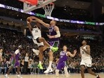 Cam Thomas #24 of the Brooklyn Nets is fouled by Brook Lopez #11 of the Milwaukee Bucks during the second half of a game at Fiserv Forum on March 09, 2023 in Milwaukee, Wisconsin.