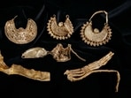 Part of the 1000-year-old medieval treasure discovered in Hoogwoud, Netherlands, consisting of jewellery and silver coins, is shown in this undated handout picture.