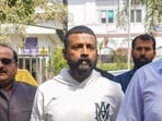 Alleged conman Sukesh Chandrashekhar at Patiala House court for appearing in connection with a money laundering case, in Delhi, Feb. 24, 2023. (PTI Photo) Alleged conman Sukesh Chandrashekhar at Patiala House court for appearing in connection with a money laundering case, in Delhi, Feb. 24, 2023. (PTI Photo)