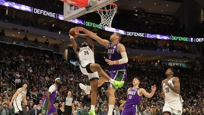 Cam Thomas #24 of the Brooklyn Nets is fouled by Brook Lopez #11 of the Milwaukee Bucks during the second half of a game at Fiserv Forum on March 09, 2023 in Milwaukee, Wisconsin. (Getty Images via AFP) Cam Thomas #24 of the Brooklyn Nets is fouled by Brook Lopez #11 of the Milwaukee Bucks during the second half of a game at Fiserv Forum on March 09, 2023 in Milwaukee, Wisconsin. (Getty Images via AFP)