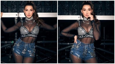 Moroccan beauty Nora Fatehi has made a big name not just in India but globally. Her bold and fearless personality has inspired several people around the world. When it comes to fashion, the ace dancer knows how to woo the crowd with her sartorial picks. In her latest Instagram photos, she can be seen acing the boss lady avatar once again in a Dolce and Gabbana outfit. (Instagram/@norafatehi) Moroccan beauty Nora Fatehi has made a big name not just in India but globally. Her bold and fearless personality has inspired several people around the world. When it comes to fashion, the ace dancer knows how to woo the crowd with her sartorial picks. In her latest Instagram photos, she can be seen acing the boss lady avatar once again in a Dolce and Gabbana outfit. (Instagram/@norafatehi)
