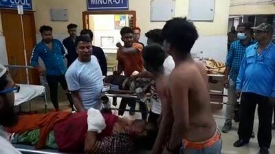 Injured Kabijul Sheikh at a Murshidabad hospital before he was referred to a hospital in Kolkata. The other two men who were injured in the explosion fled the scene. (HT Photo/Sreyasi Pal)
