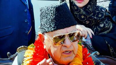 Jammu and Kashmir National Conference chief Farooq Abdullah speaks as he receives a warm welcome by his supporters on his return from Umrah, on Friday. (ANi)
