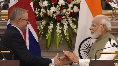 Prime Minister Narendra Modi shakes hand with his Australian counterpart Anthony Albanese after exchange of agreements and press statement in New Delhi on Friday. (AP) Prime Minister Narendra Modi shakes hand with his Australian counterpart Anthony Albanese after exchange of agreements and press statement in New Delhi on Friday. (AP)