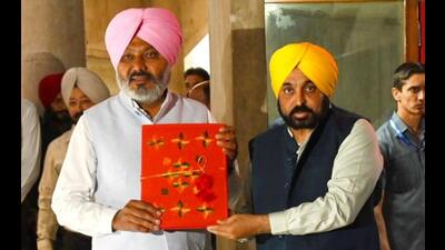 Punjab chief minister Bhagwant Mann (right) with state finance minister Harpal Singh Cheema before the budget was presented in the assembly in Chandigarh on Friday. (Ravi Kumar/HT) Punjab chief minister Bhagwant Mann (right) with state finance minister Harpal Singh Cheema before the budget was presented in the assembly in Chandigarh on Friday. (Ravi Kumar/HT)