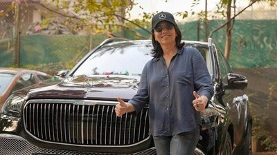Neetu Kapoor poses in-front of her brand new Mercedes Maybach GLS 600. Neetu Kapoor poses in-front of her brand new Mercedes Maybach GLS 600.