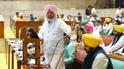 Punjab finance minister Harpal Singh Cheema seen along with chief minister Bhagwant Mann during Budget session on Friday. (HT)