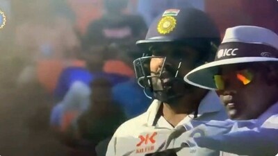 Rohit Sharma tells umpire Nitin Menon about disurbance in sight screen area