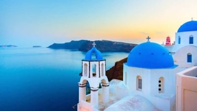 Santorini, Greece: Santorini is a stunningly beautiful Greek island with crystal clear waters and breathtaking sunsets. The island is perfect for couples looking for a romantic escape, with stunning views, delicious food, and plenty of activities to keep you entertained. (Unsplash) Santorini, Greece: Santorini is a stunningly beautiful Greek island with crystal clear waters and breathtaking sunsets. The island is perfect for couples looking for a romantic escape, with stunning views, delicious food, and plenty of activities to keep you entertained. (Unsplash)