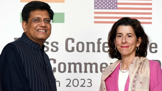 Union Minister of Commerce and Industry Piyush Goyal exchanges greetings with the United States (US) Secretary of Commerce Gina Raimondo at a joint press conference, in New Delhi on Friday. (ANI)