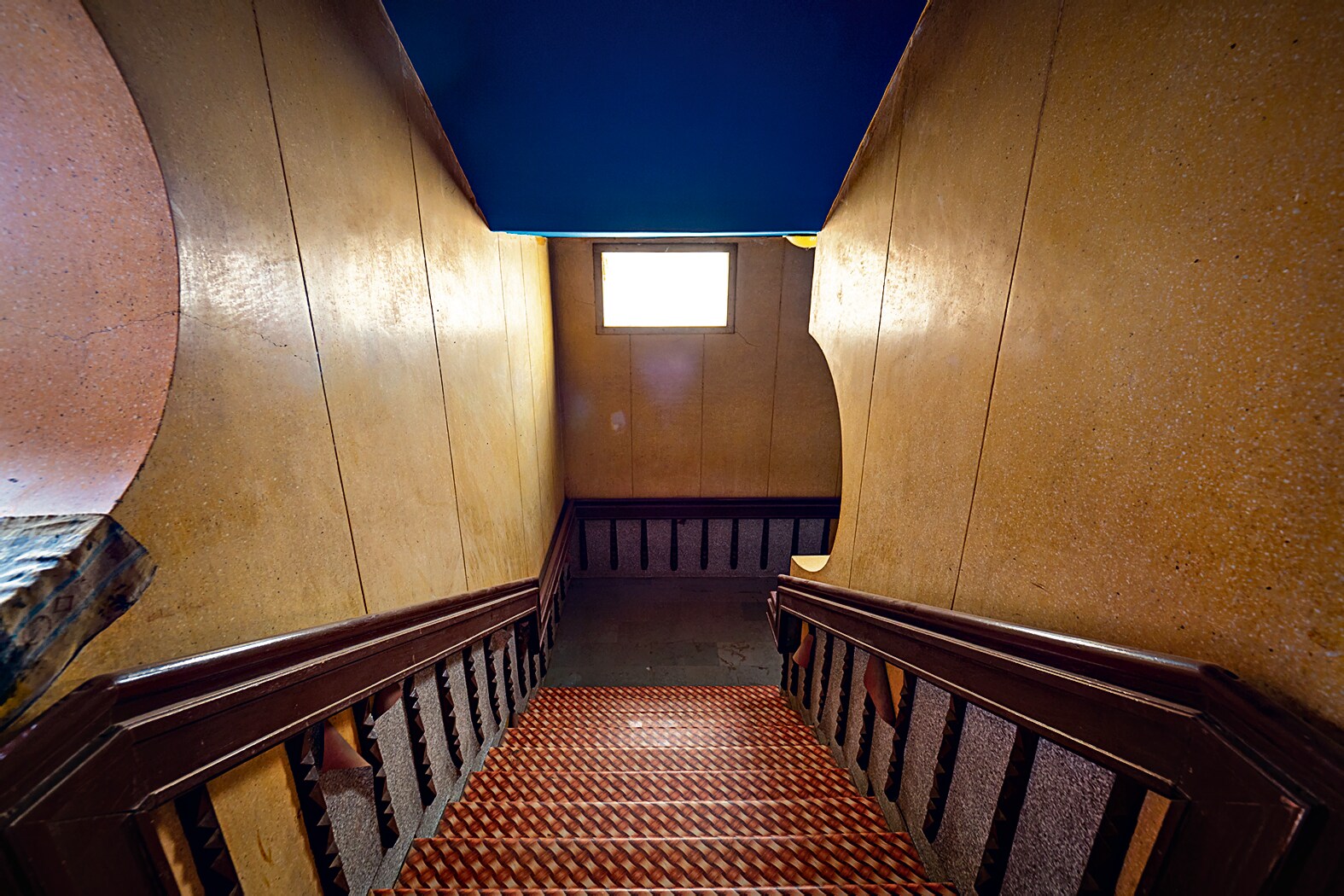 Uma Mandir in Solapur, opened in 1964, has been revamped, but an unrenovated section holds all its original textures and colours, including vintage yellow mosaic floors and teakwood bannisters. (Photo by Hemant Chaturvedi) Uma Mandir in Solapur, opened in 1964, has been revamped, but an unrenovated section holds all its original textures and colours, including vintage yellow mosaic floors and teakwood bannisters. (Photo by Hemant Chaturvedi)