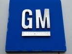 The General Motors logo is displayed outside the General Motors Detroit-Hamtramck Assembly plant. (AP) The General Motors logo is displayed outside the General Motors Detroit-Hamtramck Assembly plant. (AP)