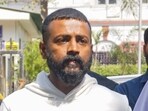 Alleged conman Sukesh Chandrashekhar at Patiala House court for appearing in connection with a money laundering case in New Delhi on Friday, Alleged conman Sukesh Chandrashekhar at Patiala House court for appearing in connection with a money laundering case in New Delhi on Friday,