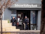 Police officers leave Silicon Valley Bank's headquarters in Santa Clara, California. Police officers leave Silicon Valley Bank's headquarters in Santa Clara, California.