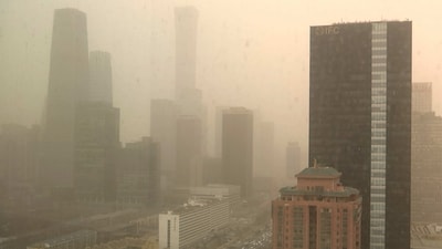 A view of the central business district shot through a glass window during a dust storm in Beijing. Skyscrapers disappeared into the haze and air quality plummeted as China's capital was enveloped in a dust storm and heavy pollution on Friday, reported AP. (Borg Wong / AP) A view of the central business district shot through a glass window during a dust storm in Beijing. Skyscrapers disappeared into the haze and air quality plummeted as China's capital was enveloped in a dust storm and heavy pollution on Friday, reported AP. (Borg Wong / AP)