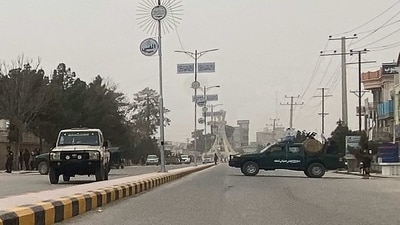Taliban security personnel (R) block a road in Mazar-i-Sharif on March 9, 2023, following a blast at the office of Taliban governor of Afghanistan's Balkh province. - Mohammad Dawood Muzammil, the Taliban governor of Afghanistan's Balkh province, was killed in a blast at his office on March 9, the province's police spokesman said. (AFP) Taliban security personnel (R) block a road in Mazar-i-Sharif on March 9, 2023, following a blast at the office of Taliban governor of Afghanistan's Balkh province. - Mohammad Dawood Muzammil, the Taliban governor of Afghanistan's Balkh province, was killed in a blast at his office on March 9, the province's police spokesman said. (AFP)