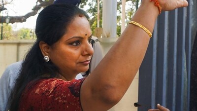 BRS MLC K Kavitha gestures as she arrives at the Enforcement Directorate (ED) office in connection with the Delhi excise policy case, in New Delhi on Saturday (PTI) BRS MLC K Kavitha gestures as she arrives at the Enforcement Directorate (ED) office in connection with the Delhi excise policy case, in New Delhi on Saturday (PTI)