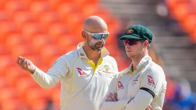 Australia's Nathan Lyon chat with his captain Steve Smith during the third day of the fourth cricket test match between India and Australia in Ahmedabad, India, Saturday, March 11, 2023. (AP Photo/Ajit Solanki) (AP) Australia's Nathan Lyon chat with his captain Steve Smith during the third day of the fourth cricket test match between India and Australia in Ahmedabad, India, Saturday, March 11, 2023. (AP Photo/Ajit Solanki) (AP)