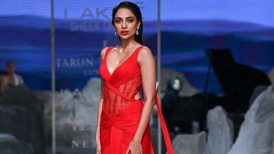 Sobhita Dhulipala turns showstopper for Lakme Sheer Drama X Tarun Tahiliani Luxe Pret at Lakme Fashion Week in partnership with FDCI. She wore a red saree-inspired gown. Sobhita Dhulipala turns showstopper for Lakme Sheer Drama X Tarun Tahiliani Luxe Pret at Lakme Fashion Week in partnership with FDCI. She wore a red saree-inspired gown. 