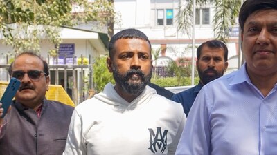 Alleged conman Sukesh Chandrashekhar at Patiala House court for appearing in connection with a money laundering case in New Delhi on Friday, (PTI) Alleged conman Sukesh Chandrashekhar at Patiala House court for appearing in connection with a money laundering case in New Delhi on Friday, (PTI)