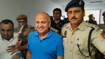 AAP leader Manish Sisodia being brought to Rouse Avenue Court in connection with the Delhi excise policy case in New Delhi on Friday. (PTI) AAP leader Manish Sisodia being brought to Rouse Avenue Court in connection with the Delhi excise policy case in New Delhi on Friday. (PTI)