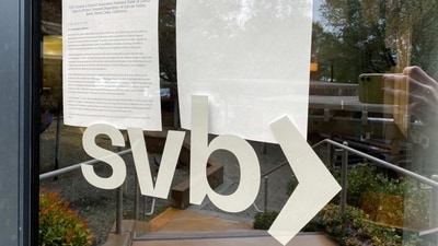 A locked door to a Silicon Valley Bank (SVB) location on Sand Hill Road is seen in Menlo Park, California, U.S. March 10, 2023. (REUTERS)
