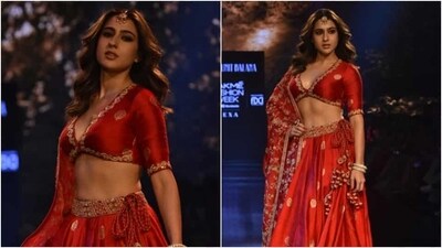 Sara Ali Khan gracefully walked the ramp at the ongoing Lakme Fashion Week in a bridal red lehenga by Punit Balana. (HT Photo/Varinder Chawla)