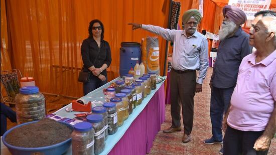 Visitors during the two-day exhibition of handmade, recycled products at Rose Garden in Ludhiana on Saturday. (Gurpreet Singh/HT)
