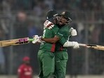 Bangladesh's Najmul Hossain Shanto, right, and Taskin Ahmed celebrate after their win in the the second T20 cricket match against England in Dhaka, Bangladesh, Sunday, March 12, 2023. (AP Photo/Aijaz Rahi) Bangladesh's Najmul Hossain Shanto, right, and Taskin Ahmed celebrate after their win in the the second T20 cricket match against England in Dhaka, Bangladesh, Sunday, March 12, 2023. (AP Photo/Aijaz Rahi)