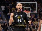 Golden State Warriors guard Stephen Curry (30) reacts after making a three point basket to tie the score against the Milwaukee Bucks during the fourth quarter at Chase Center.
