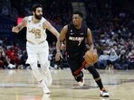 Miami Heat guard Kyle Lowry (7) drives against Cleveland Cavaliers guard Ricky Rubio (13) during the second half of an NBA basketball game, Tuesday, Jan. 31, 2023, in Cleveland. Miami Heat guard Kyle Lowry (7) drives against Cleveland Cavaliers guard Ricky Rubio (13) during the second half of an NBA basketball game, Tuesday, Jan. 31, 2023, in Cleveland.