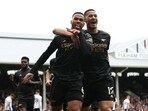Arsenal's Gabriel celebrates scoring their first goal with William Saliba  