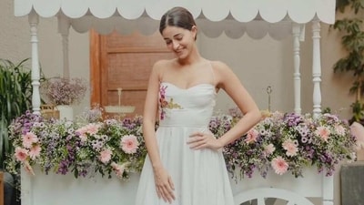 Ananya Panday's simple white midi dress is the perfect bridesmaid look for your BFF's bachelorette. (Instagram) Ananya Panday's simple white midi dress is the perfect bridesmaid look for your BFF's bachelorette. (Instagram)