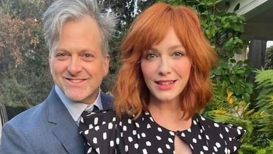 Christina Hendricks with George Bianchini. Christina Hendricks with George Bianchini.