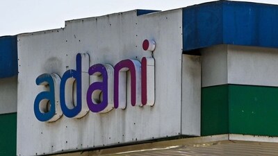 Signage of Adani Group at company's gas station in Ahmedabad. (Bloomberg) Signage of Adani Group at company's gas station in Ahmedabad. (Bloomberg)