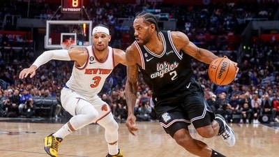 Los Angeles Clippers forward Kawhi Leonard (2) drives past New York Knicks guard Josh Hart (3) during the second half of an NBA basketball game Saturday, March 11, 2023, in Los Angeles. (AP) Los Angeles Clippers forward Kawhi Leonard (2) drives past New York Knicks guard Josh Hart (3) during the second half of an NBA basketball game Saturday, March 11, 2023, in Los Angeles. (AP)