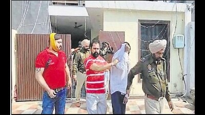 Police taking the accused for further probe in the case in Ludhiana on Sunday. (HT Photo)