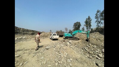 The accused had been operating an amber stone crusher at Talwara and were using two tippers and an excavator for quarrying activities. (HT Photo)