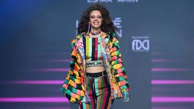 Kalki Koechlin turned showstopper for designer label Jajaabor at Lakme Fashion Week. She wore a bright outfit. Kalki Koechlin turned showstopper for designer label Jajaabor at Lakme Fashion Week. She wore a bright outfit.