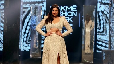 Parineeti Chopra turned showstopper for Ritika Mirchandani at Lakme Fashion Week. She wore a white embroidered outfit. Parineeti Chopra turned showstopper for Ritika Mirchandani at Lakme Fashion Week. She wore a white embroidered outfit.